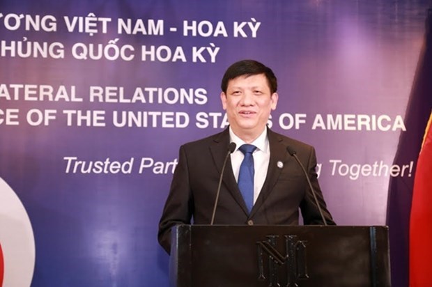 Acting Minister of Health Nguyen Thanh Long addresses the ceremony in Hanoi on October 9 (Photo: cand.com.vn)