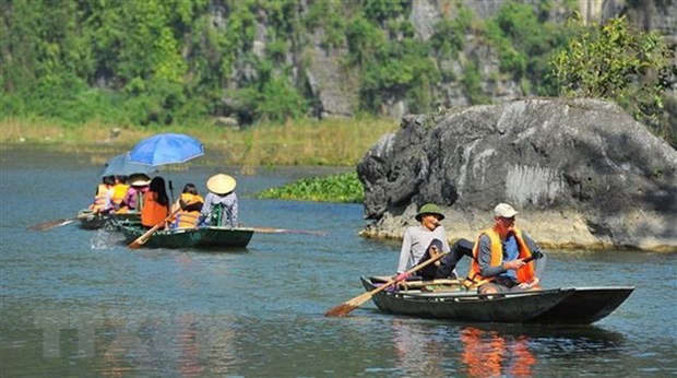 Foreign visitors at Tam Coc-Bich Dong tourism site (Photo: VNA)