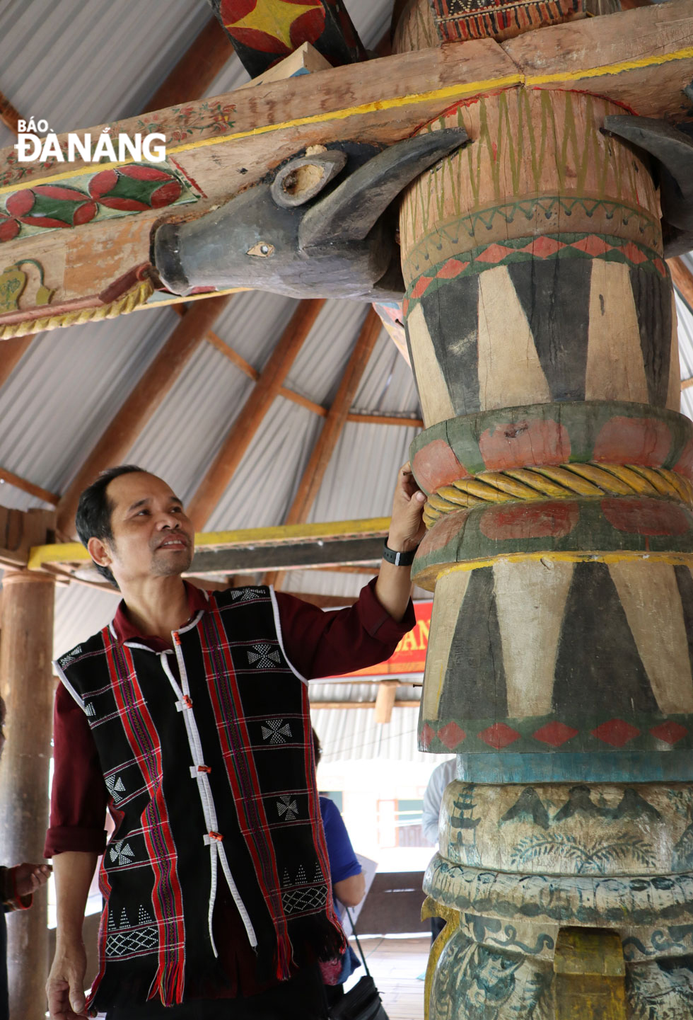 Some cultural symbols are vividly carved inside a traditional Guol house.