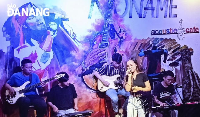 An acoustic music performance at the No Name Café