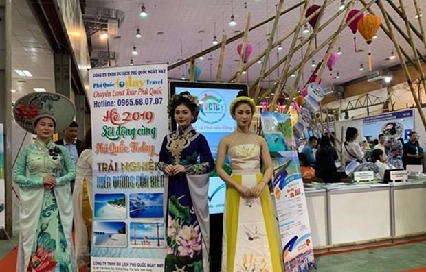 Staff of a travel company at the Vietnam International Travel Mart 2019 (Photo: VNA)
