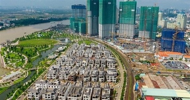 Real estate is among sectors requiring large investment. Increasing the interest expense deduction limit to 30 percent would help enterprises have more capital for investment in the context that most firms in Vietnam were thinly-capitalised with the level of debt much greater than equity capital (Photo: laodong.vn)