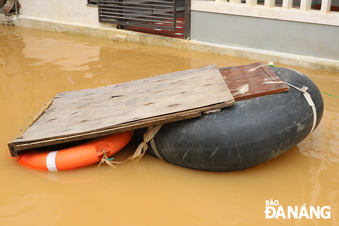 Villagers-created raft used in flooded areas