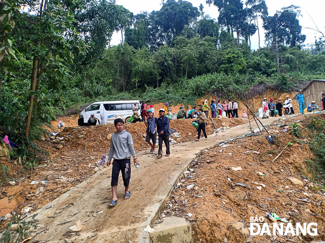   Tra Leng people now manage to set aside the pain of great loss caused by the devastating landslide to embark upon building a new life on the hard-hit land