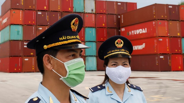 Rising exports and effective control of the coronavirus have kept Viet Nam's economy growing despite the pandemic (Photo: https://asia.nikkei.com/)