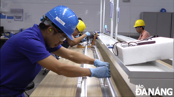 Da Nang is on course to increase the proportion of hi-tech and high value-added industries. In the photo is the inside of the city-based Sunshine aerospace components factory