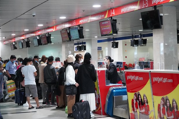 Passengers line up to check in at Vietjet Air's counter (Photo: Vietjet Air)