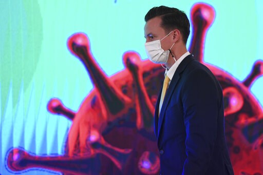 James Teague, president of AstraZeneca's in Thailand, attends a signing ceremony at Government House in Bangkok on 26 November (Photo: AP)