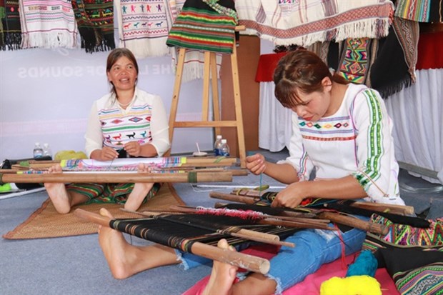 Many artists are taking part in the second Viet Nam Brocade Culture Festival being held in Dak Nong province. (Photo: nld.com.vn)