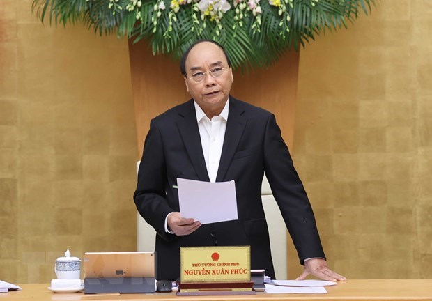 Prime Minister Nguyen Xuan Phuc at the monthly government meeting on December 2. (Photo: VNA)