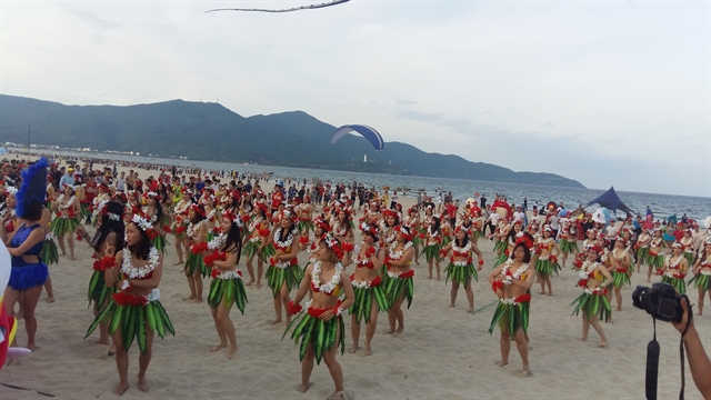 Dancers on the beach in Da Nang. The city is a popular destination for Japanese tourists.
