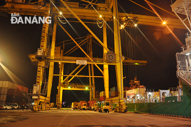 Many container vehicles entering the port for cargo clearance