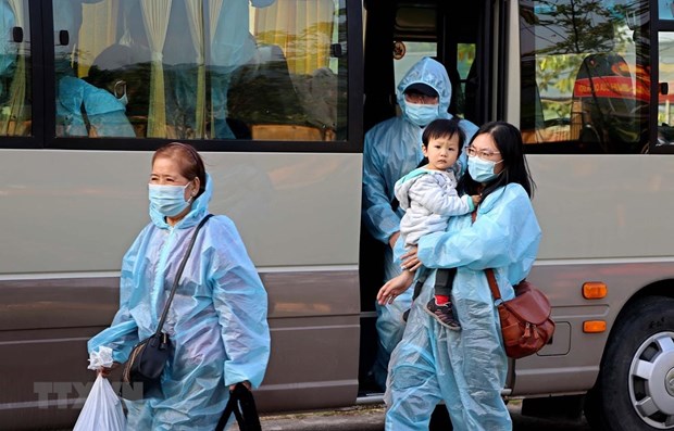 Citizens repatriated from abroad arrive at a quarantine site (Photo: VNA)