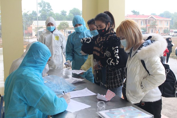 People returning from abroad arrive at a quarantine site in northern Thai Nguyen province (Photo: VNA)