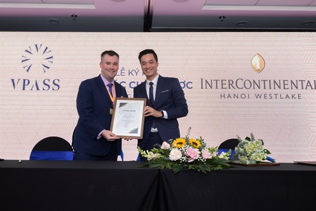 Area Director of Sales Marketing – North Vietnam at InterContinental, David Pearson (left), seen together with VPASS representative at signing ceremony on Monday. — Photo courtesy of VPASS