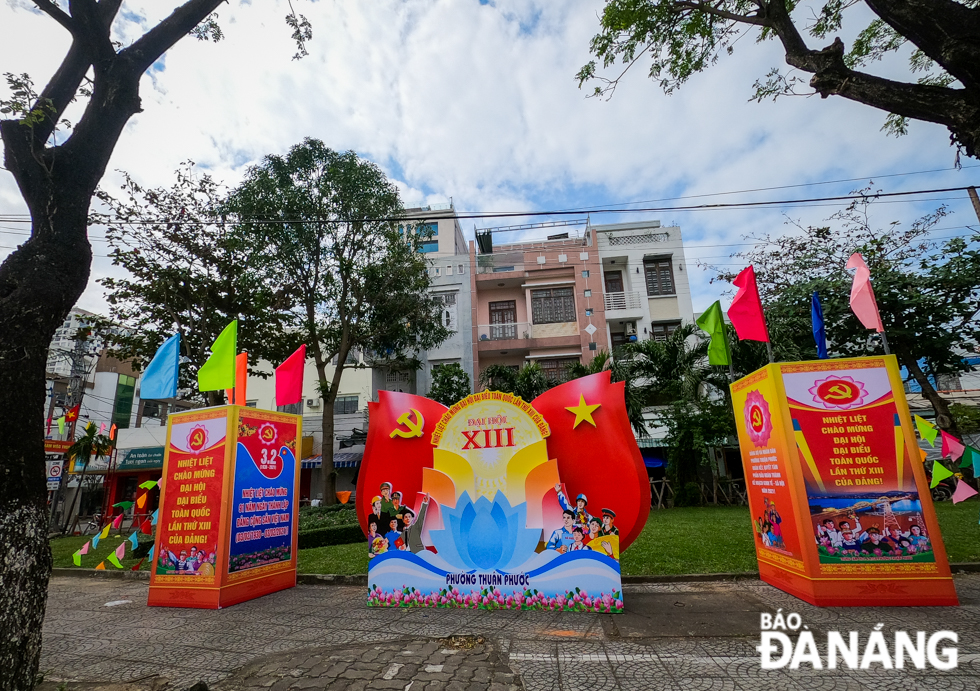 Panels with welcoming words towards the 13th National Party Congress are seen on 3 February Street, …