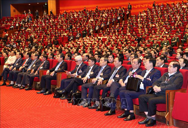 Các đại biểu dự ngày làm việc thứ ba Đại hội XIII của Đảng. Ảnh: TTXVN