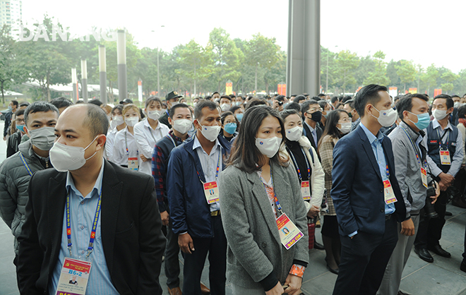 The reporters lining up to wait for having their nose and throat swab samples taken for the testing