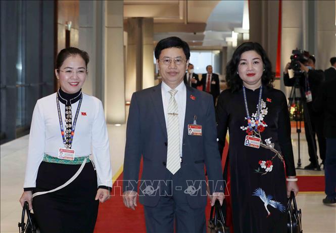 Các đại biểu đoàn Đảng bộ tỉnh Nghệ An đến dự phiên họp sáng 30/1. Ảnh: TTXVN