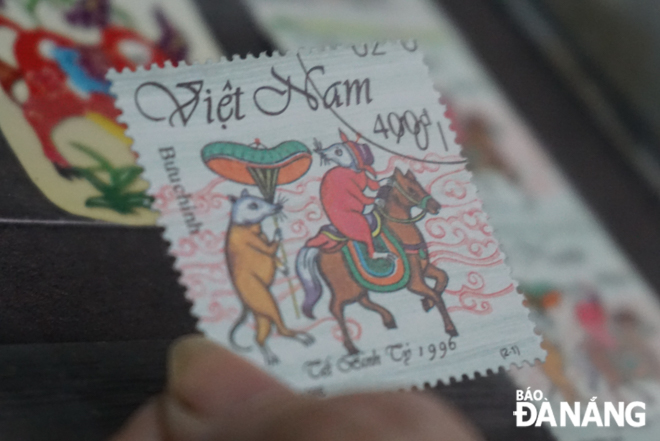 A Mrs Thanh-collected stamp featuring 'Dam Cuoi Chuot’ (Rat's wedding) 