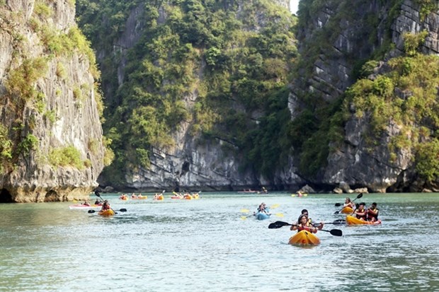 Tourists visit Ha Long Bay in the northern province of Quang Ninh. (Photo: VNA)