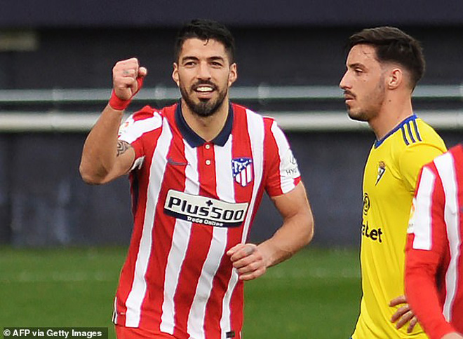 Tiền đạo Luis Suarez (trái) tỏa sáng rực rỡ trong màu áo Atletico Madrid. Ảnh: AFP	