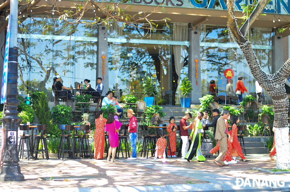 Many cafes opening during Tet being more bustling with customers on Lunar New Year’s Day