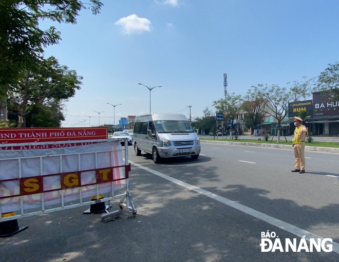 The traffic police force pulling over vehicles entering the city for check.