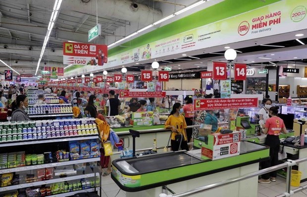 Many consumers have opted for online shopping, convenience stores, shopping centres, and supermarkets, rather than traditional markets. (Photo: VNA)