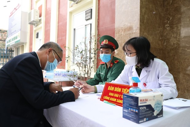 The second phase of human trial of home-grown Nano Covax is carried out at the Military Medical University on February 26. (Photo: VNA)