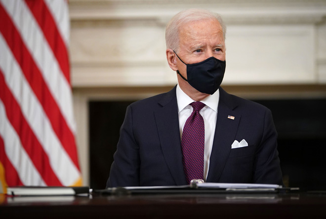 Tổng thống Joe Biden dự định ký phê chuẩn gói cứu trợ có tên chính thức là “Kế hoạch giải cứu nước Mỹ” trong ngày 12-3. 					Ảnh: AFP/Getty Images