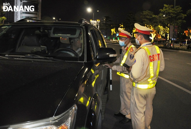 A car driver being stopped by the police for a check