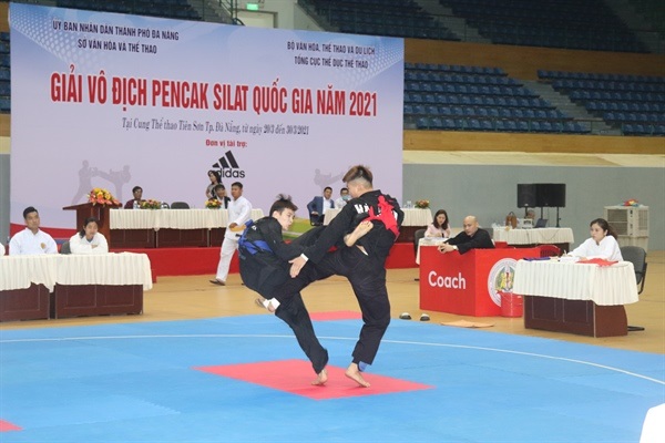 Pencak Silat fighters in an action shot  