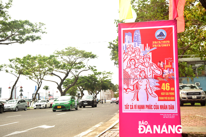 Panels publicising the 46th anniversary of the city’s liberation placed along a downtown street