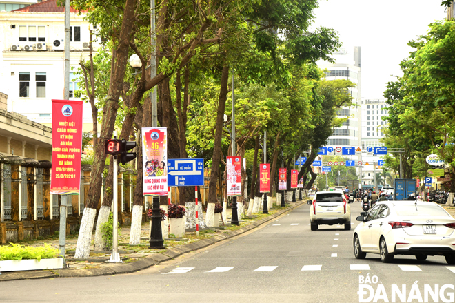 A section of Tran Phu Street enlivened with colourful banners and panels