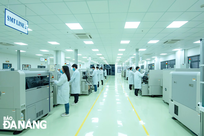    Da Nang is giving priority to high technology, an economic sector for driving the local growth. Picture taken at the surface-mount technology (SMT) assembly and manufacturing plant, located in the Da Nang Hi-Tech Park