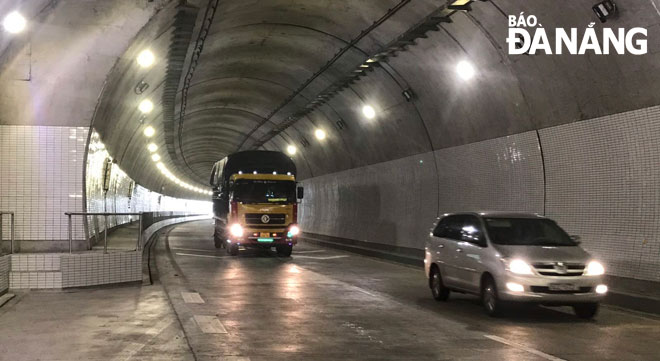  Vehicles are seen travelling through Hai Van Tunnel 2