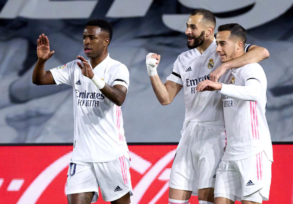 Với bộ ba tấn công Vinicius Jr, Benzema, Asencio (trái sang), Real Madrid hoàn toàn có thể giành một kết quả thuận lợi trên sân Liverpool ở trận đấu tứ kết lượt về UCL 2020-2021. 								Ảnh: UEFA