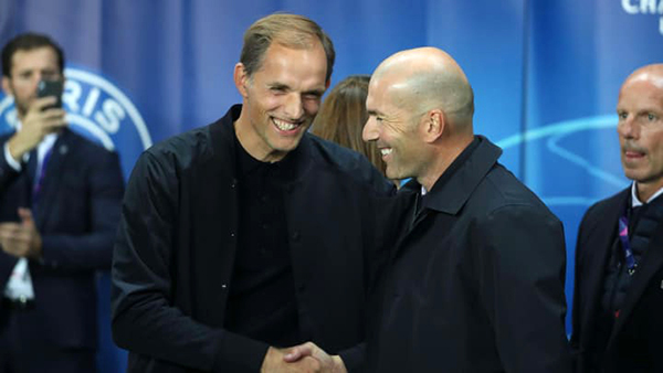 Trận đấu bán kết (lượt đi) sẽ là cuộc đấu trí của 2 HLV Tuchel (trái) và Zidane khi cơ hội đang được chia đều cho cả hai. ảnh XAVIER LAINER 