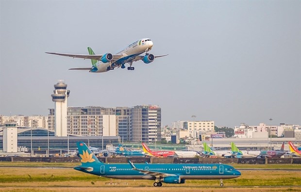 Aircraft of airlines at an airport. (Photo: VNA) 