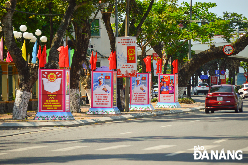 Colourful banners and panels are placed in front of the headquarters of the Da Nang Party Committee.