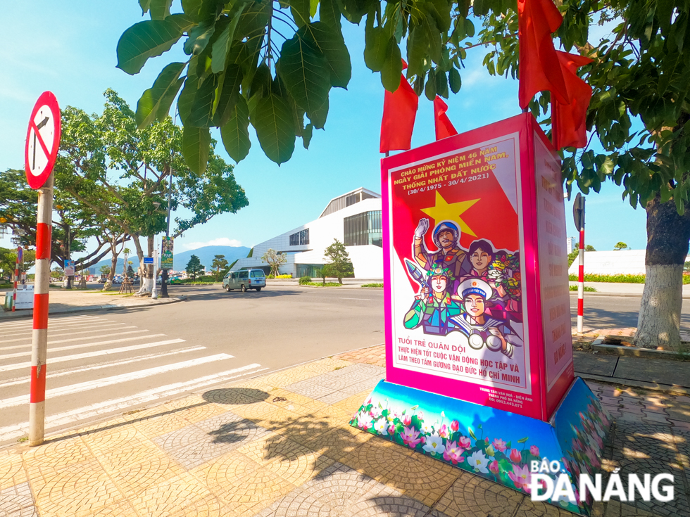  A panel placed at the intersection of  Bach Dang and a street approaching the Dien Hai Citadel showcasing the army's great determination in studying and following the late State President Ho Chi Minh's moral example.