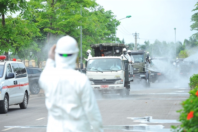 Army chemical units spray disinfectants at the Kim Chung campus of the National Hospital for Tropical Diseases in Hà Nội's Đông Anh District on Thursday. —VNA/VNS Photo Minh Đức