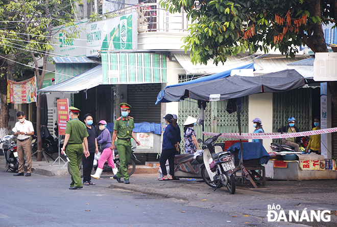 Luong Ngoc Quyen Street is put under lockdown in order to spray chemical disinfectants for the prevention of COVID-19.