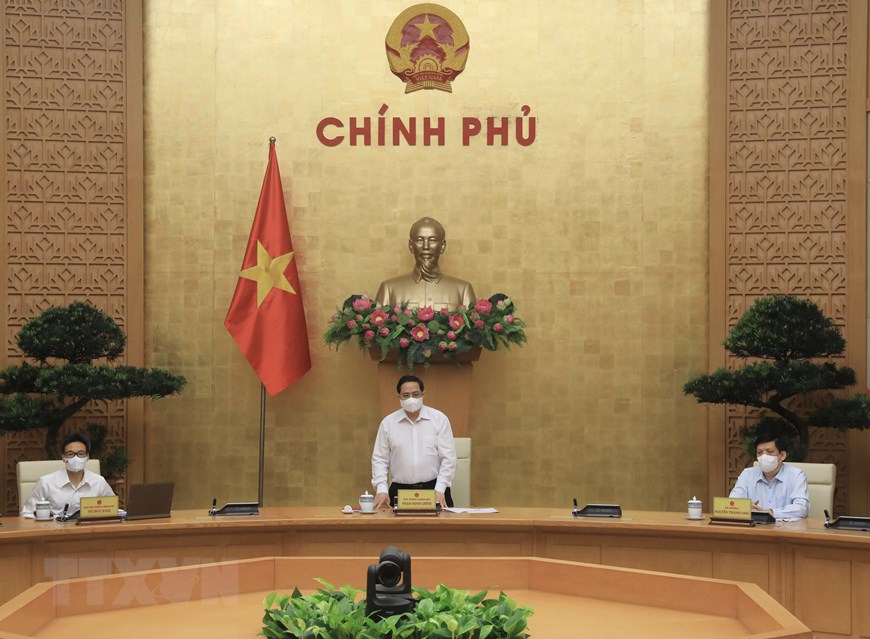 Prime Minister Pham Minh Chinh presides over an online working session on Friday between the National Steering Committee for COVID-19 Prevention and Control and representatives from ministries and nationwide localities. (Photo: VNA)