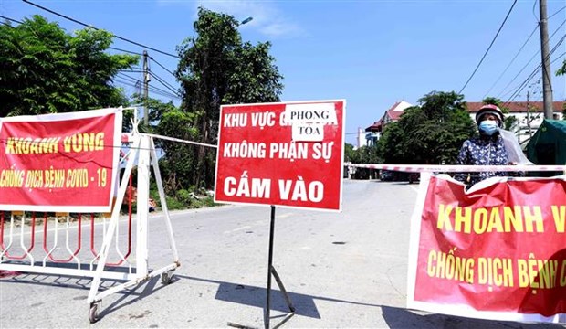 Chốt kiểm soát dịch bệnh COVID -19 tại khu vực Nhà văn hóa cộng đồng thị trấn Yên Lạc. (Ảnh: Hoàng Hùng/TTXVN)