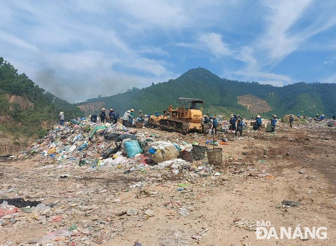 Scrap collectors at Khanh Son landfill are at high risk of infection from domestic waste. Photo: HOANG HIEP