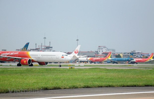 Planes park at Noi Bai International Airport in Hanoi (Photo: VNA)