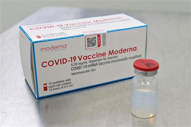 Vaccine phòng Covid-19 của hãng dược Moderna. Ảnh: AFP/ TTXVN