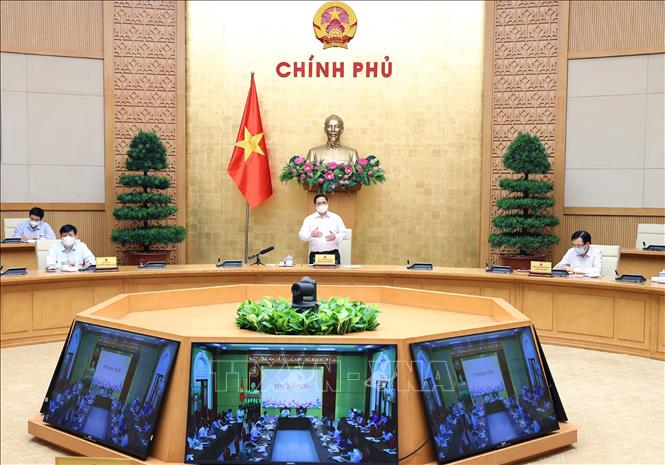 Thủ tướng Phạm Minh Chính phát biểu kết luận cuộc họp trực tuyến với hai tỉnh Bắc Giang và Bắc Ninh. Ảnh: Dương Giang/TTXVN